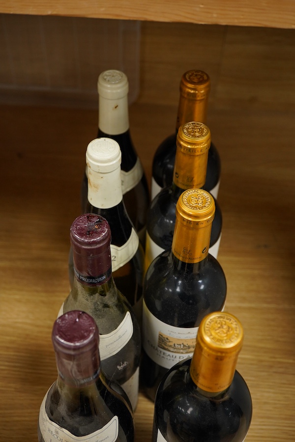 Eight bottles of wine; Chateau d’Agassac 1999, four bottles, Puligny-Montrachet 2002, two bottles, Côtes du Rhône 1978, two bottles